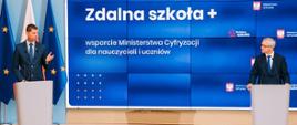 Minister Dariusz Piontkowski i minister Marek Zagórski podczas konferencji prasowej.