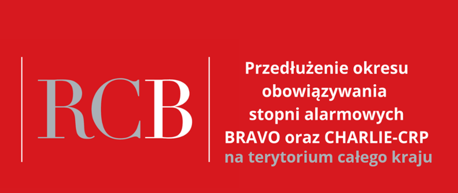 Baner w kolorze czerwonym z napisem informującym o przedłużeniu okresu obowiązywania stopni alarmowych