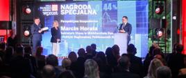 Wiceminister funduszy i polityki regionalnej i Pełnomocnik Rządu ds. CPK Marcin Horała podczas Gali 200 największych firm tygodnika Wprost, minister stoi przy mównicy i przemawia do mikrofonu