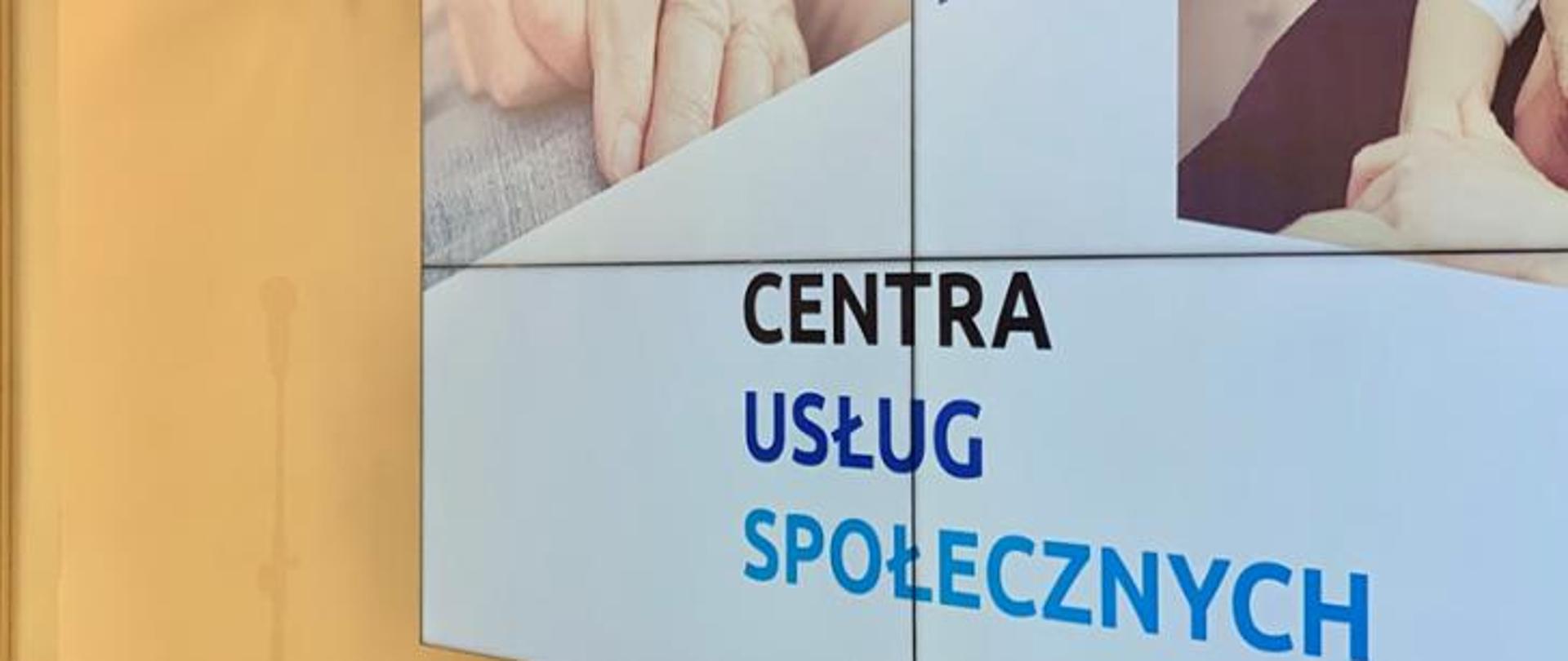Napis Centra Usług Społecznych