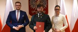 Minister Michał Woś, Łowczy Krajowy PZŁ Paweł Lisiak, wiceminister klimatu Małgorzata Golińska