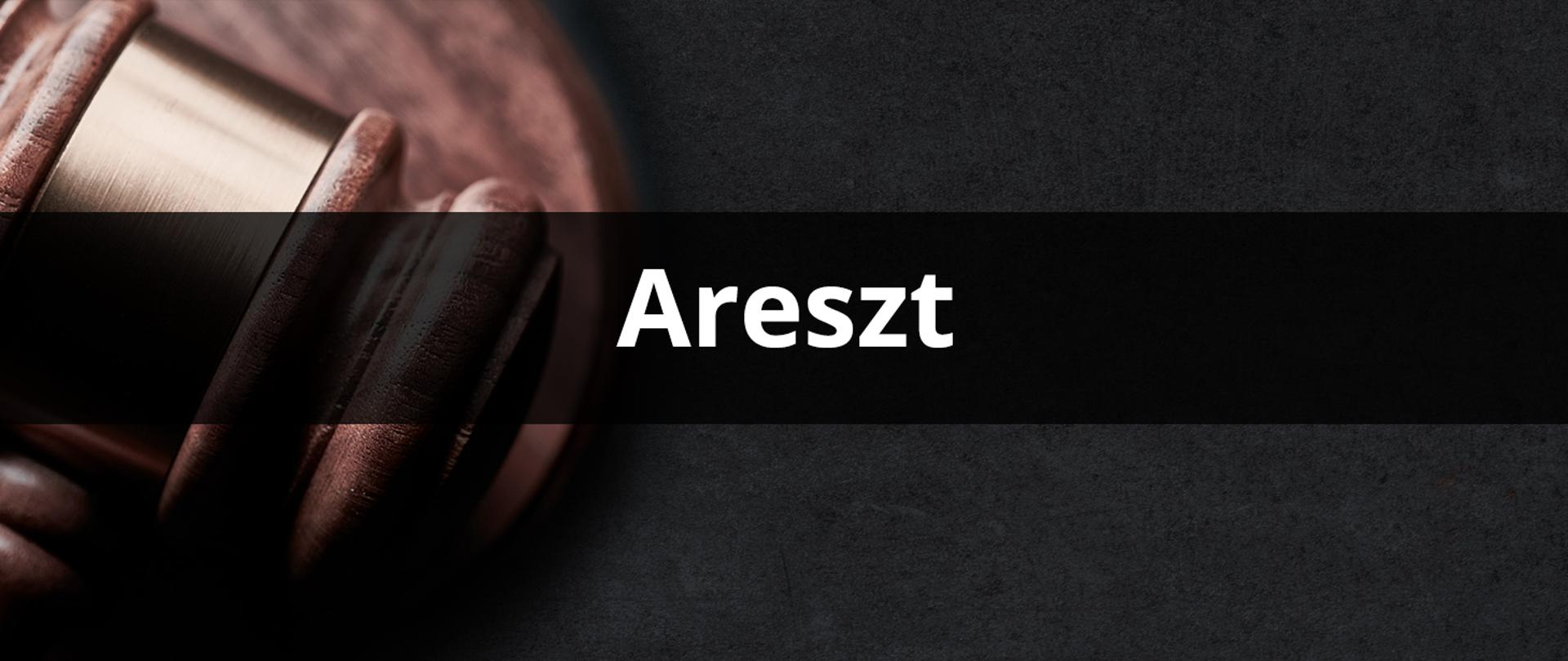 Baner areszt. W tle młotek
