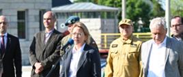 minister Anna Moskwa mówi do mikrofonu