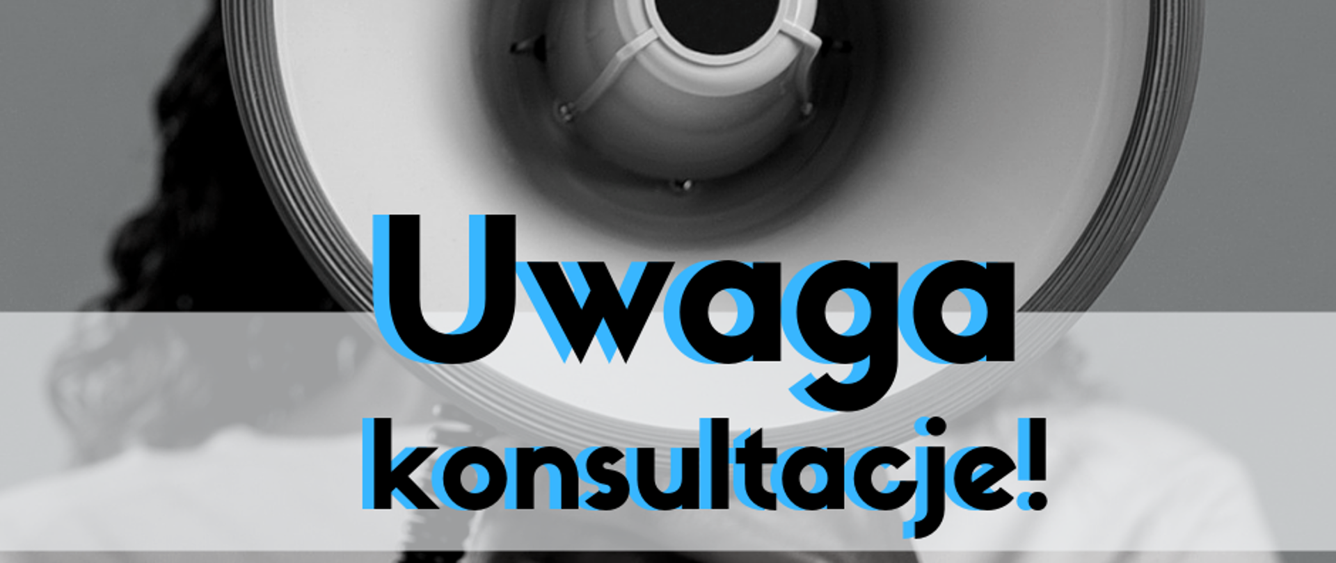 Megafon. Napis: "Uwaga konsultacje!"