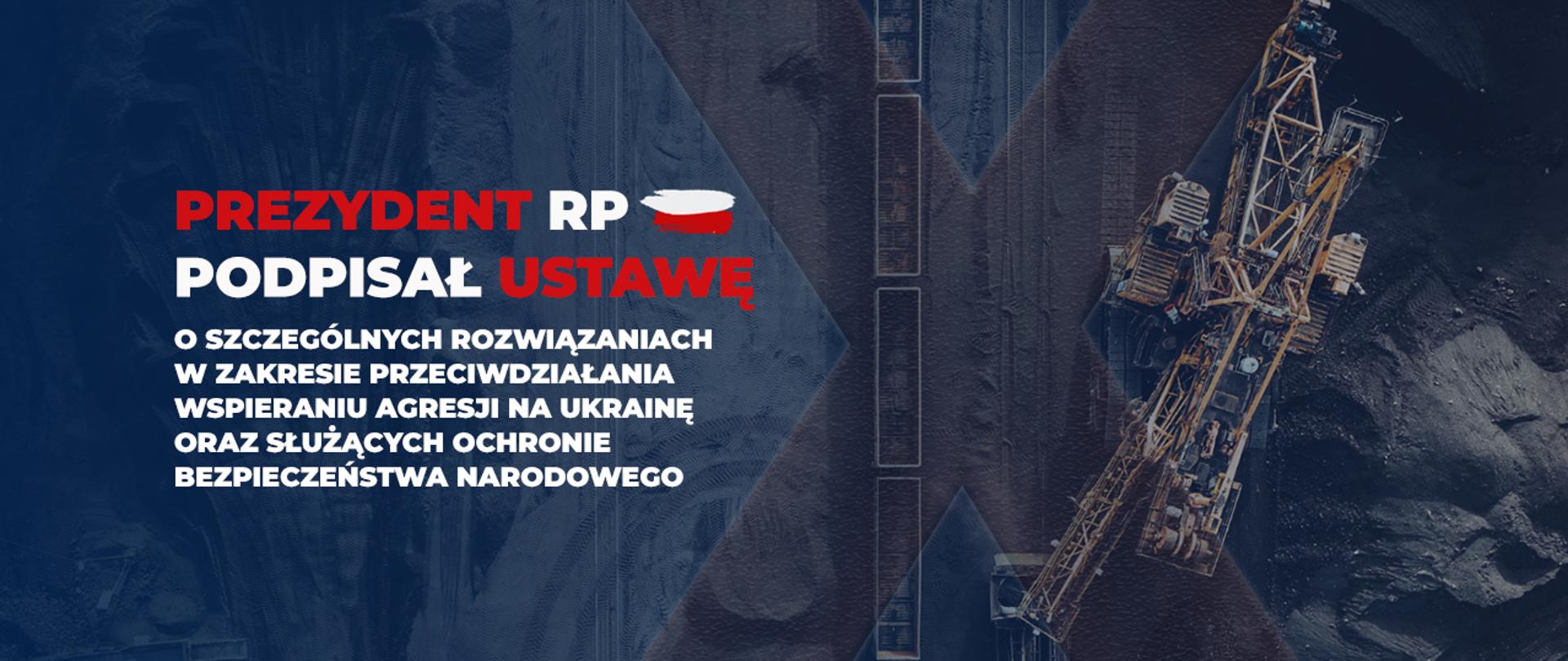 Grafika przedstawiająca przekreślone zdjęcie wizualizujące wydobycie węgla ładowanego do wagonów. Po lewej stronie napis: Prezydent RP podpisał ustawę o szczególnych rozwiązaniach w zakresie przeciwdziałania wspieraniu agresji na Ukrainę oraz służących ochronie bezpieczeństwa narodowego.